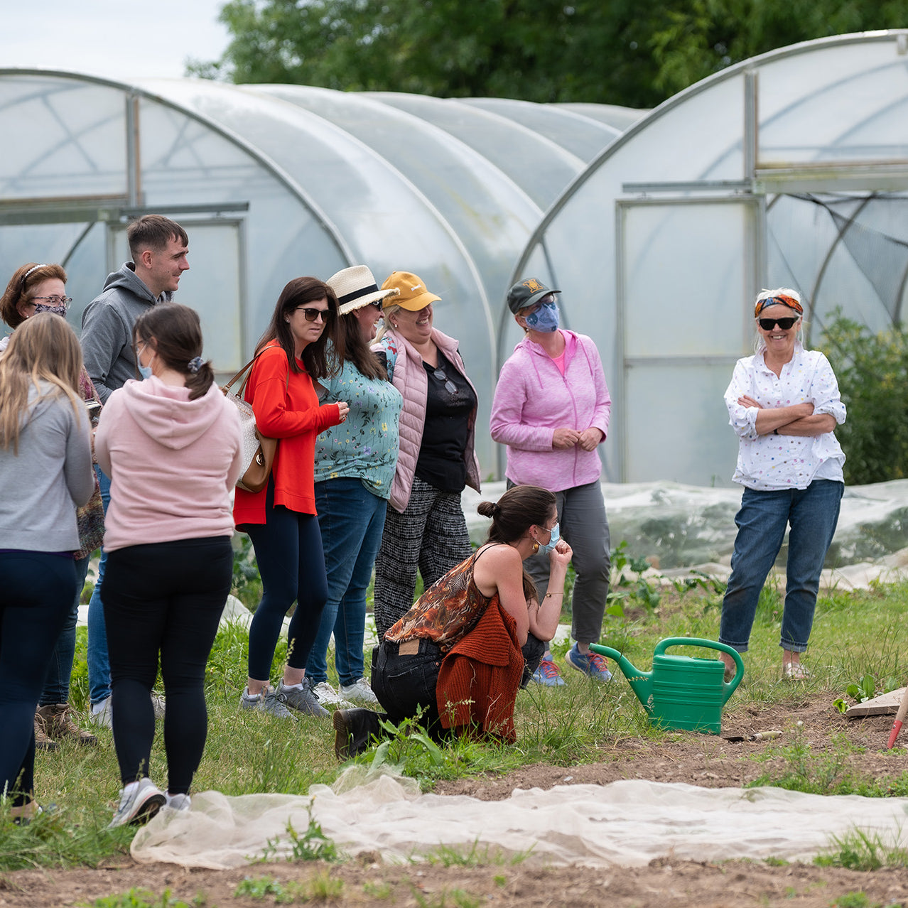 Group of teachers listening to Richard in the garden at GROW HQ on the 'how to create a school garden' teacher training course