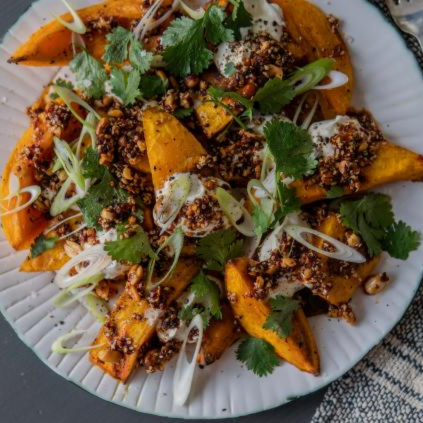 Pumpkin With Crème Fraiche, Peanut Rayu, Coriander & Spring Onion