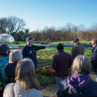 A group of people outdoors at GROW HQ with Richard.
