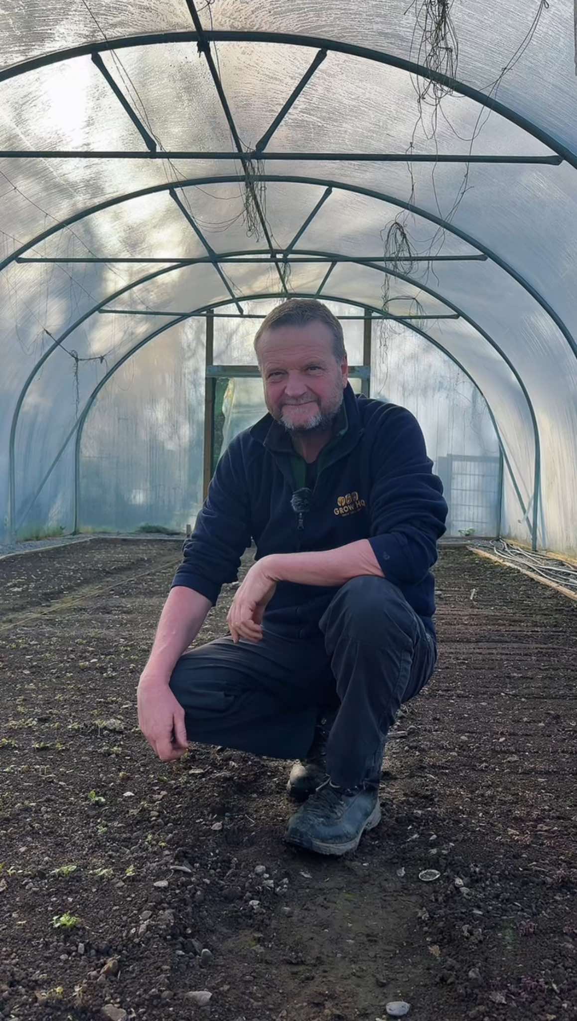 Richard in a Polytunnel ready to start growing at GROW HQ
